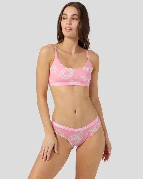 Pink mesh bandana-print two-piece swimsuit with spaghetti straps and low-rise bottoms.