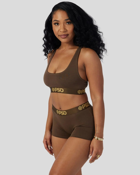Cocoa brown racerback sports bra and boy short set with gold logo waistband.