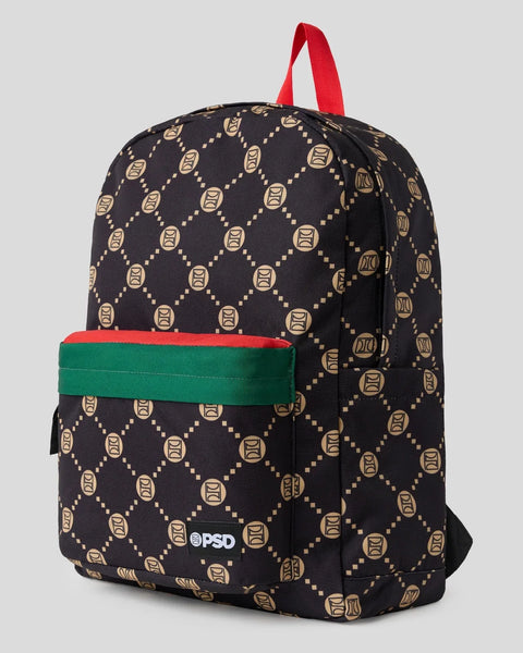 Black backpack with tan geometric emblem pattern, red shoulder straps, and green front pocket band.