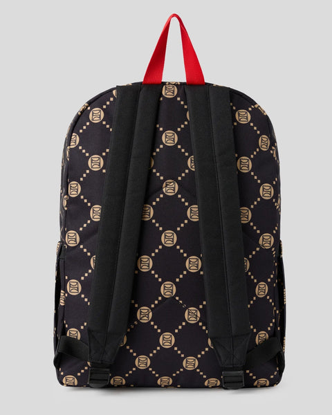 Black backpack with gold monogram pattern and red shoulder straps, shown from rear view.