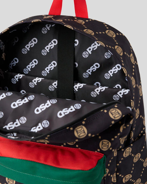 Black backpack with gold emblem pattern, red shoulder straps, red and green color-block base, open main compartment with patt
