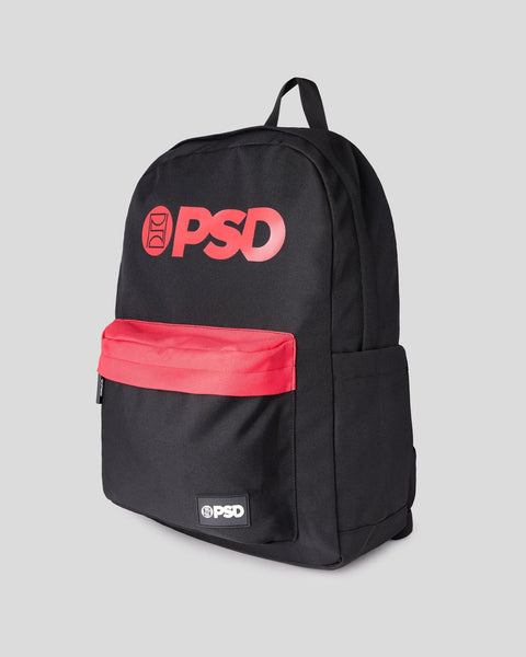 Black backpack with red "PSD" logo on front and red zippered pocket.