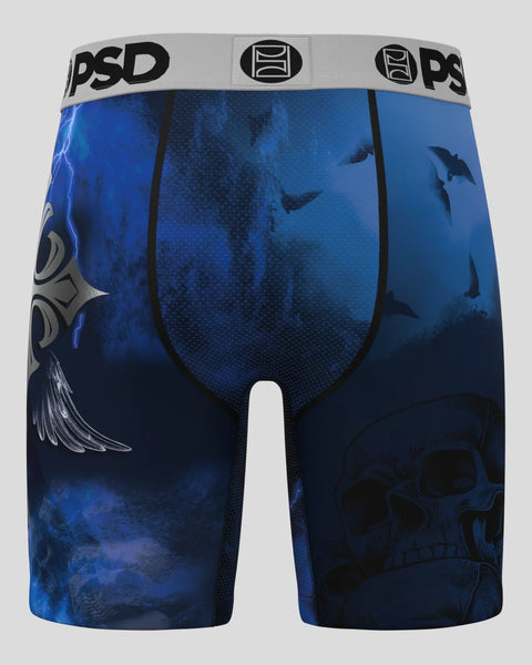 Blue and black PSD boxer shorts with wing, skull, and lightning bolt graphics on front and sides.