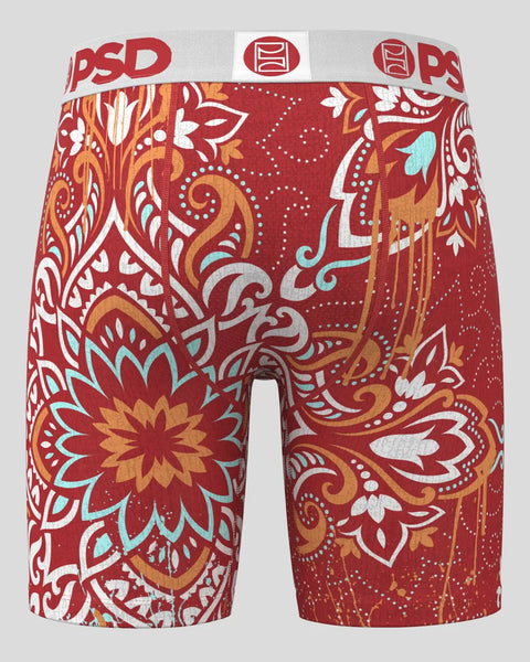 Red shorts with ornate floral and mandala pattern in white, gold, and turquoise with PSD waistband.