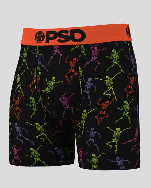 Black boxer shorts with multicolored skeleton print and orange PSD waistband.