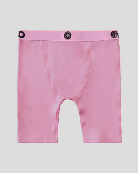 Pink boxer briefs with branded waistband and centered seams on white background.