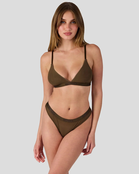 Brown mesh bikini set with thin straps and low-rise bottom on model.