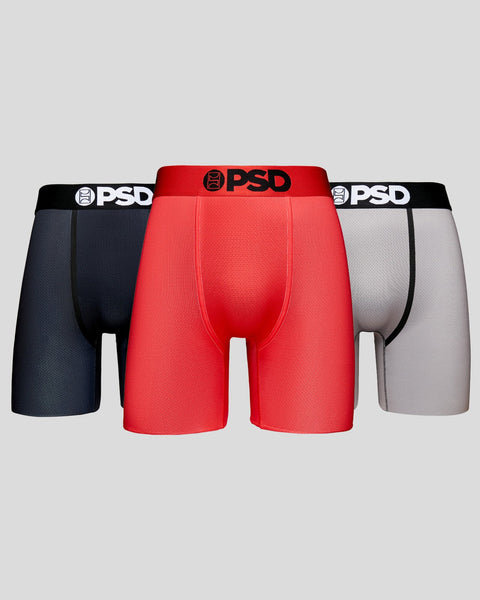 Three mesh boxer briefs in red, black, and gray with PSD waistbands displayed front view.
