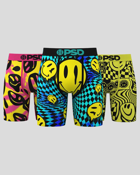Three PSD boxer briefs with yellow smiley faces, checkered patterns, and abstract designs in pink, cyan, and yellow colorways
