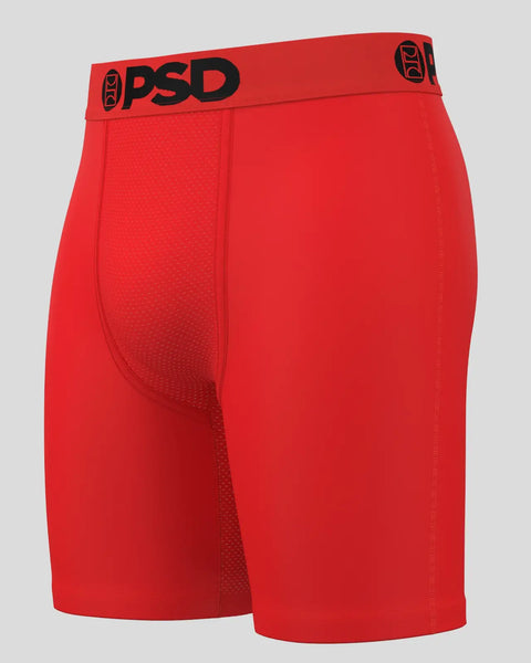 Red PSD brand boxer shorts with black waistband logo and textured fabric panel on front.