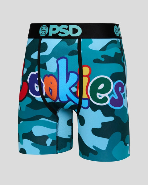 PSD brand boxer briefs with blue camouflage pattern and colorful "Cookies" text graphic on front.