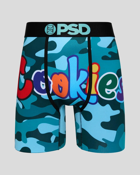 PSD blue camouflage boxer shorts with colorful "Cookies" text and black waistband.