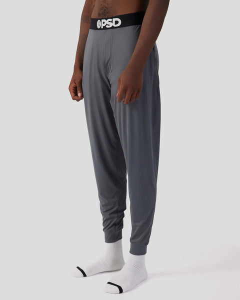 Charcoal lounge pant with black and white PSD waistband and ribbed cuffs.