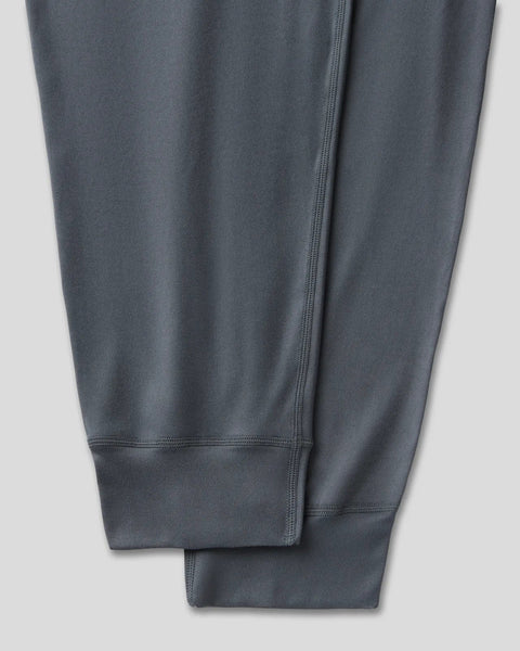 Charcoal lounge pants with ribbed waistband and ankle cuffs, displayed flat against white background.