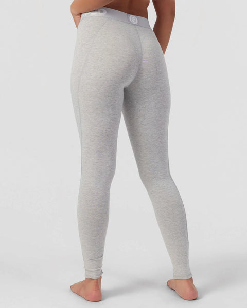 Grey athletic leggings with waistband logo, shown from back view on model.