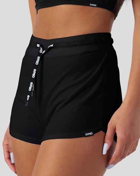 Black modal cami top and shorts sleep set with button-front detail on shorts.