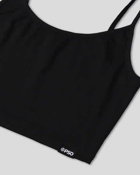 Black cami tank with thin straps and elastic waistband, PSD branded label at hem.