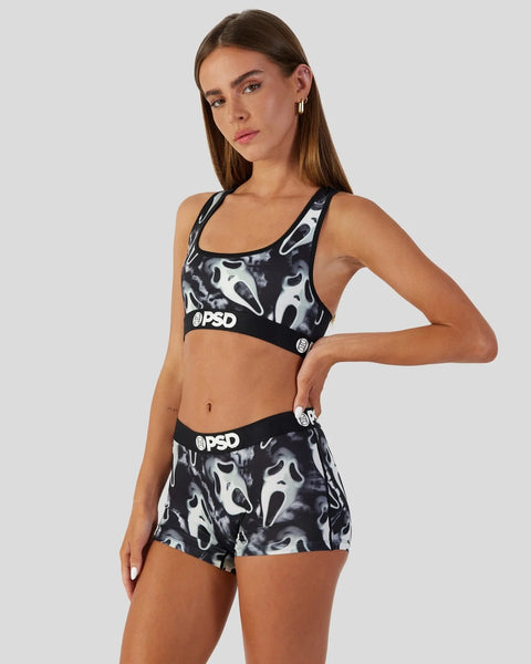 Women's sports bra and shorts set with ghost face print in black and white.