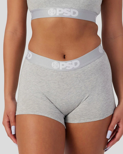 Athletic grey modal sports bra and shorts set with PSD branding on elastic waistbands.