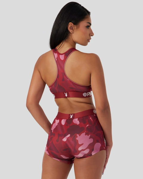 Burgundy racer-back sports bra and matching camouflage shorts set with Playboy branding, shown from back view.