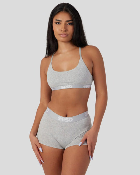 Athletic grey two-piece modal set with racerback bra top and boy short bottoms with branded waistband.