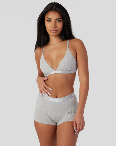Light grey bra and shorts set with thin shoulder straps and elastic waistband.