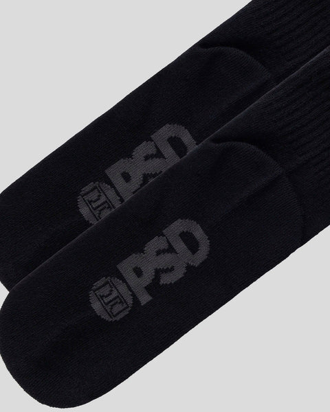Black crew socks with embroidered branding on the calf.