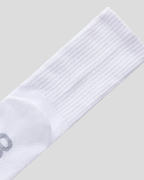 White ribbed crew sock with cushioned sole and reinforced heel.