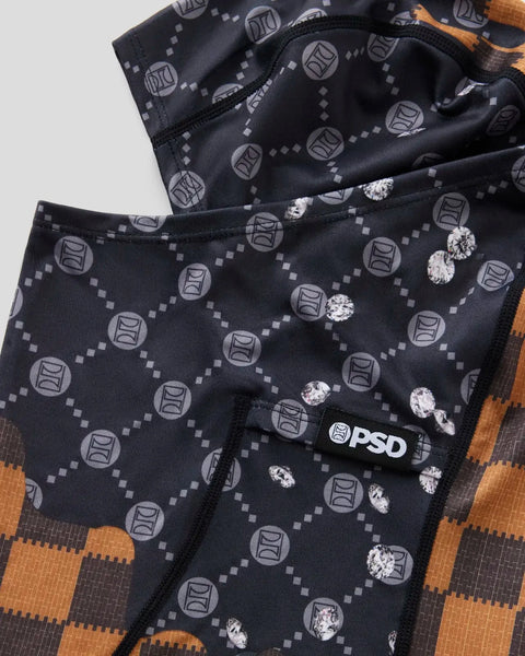 Black underwear with repeating emblem and diamond pattern, white crystal accents, PSD brand label visible.
