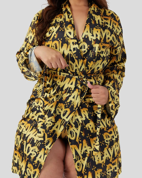 Black and gold graffiti print robe with notch collar and matching belt tie.