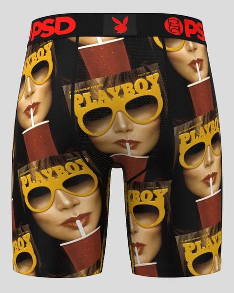 Black PSD boxer briefs with repeating Playboy magazine cover imagery, yellow sunglasses, and red waistband.