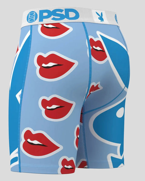 Blue boxer briefs with red lip prints and white outlines, featuring PSD branding on waistband.