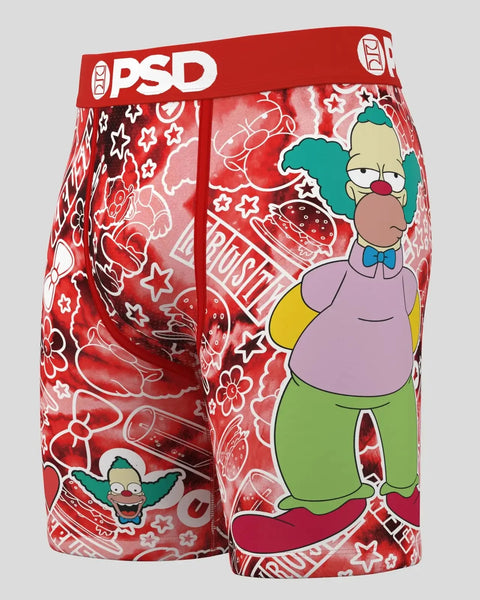 Red PSD boxer briefs with Krusty the Clown character print, stars, and food patterns throughout.