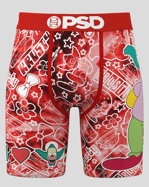 Red PSD boxer briefs with Krusty the Clown cartoon character print, stars, flowers, and text pattern throughout.