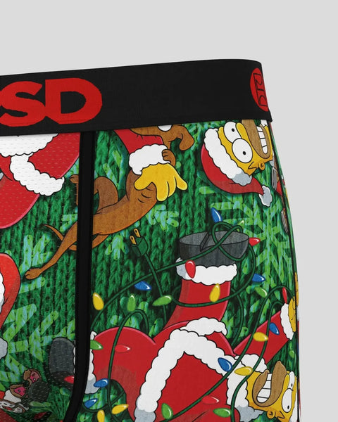 Black and red Homer Simpson character sweater with white beard, yellow hands, and green background with colorful holiday ligh