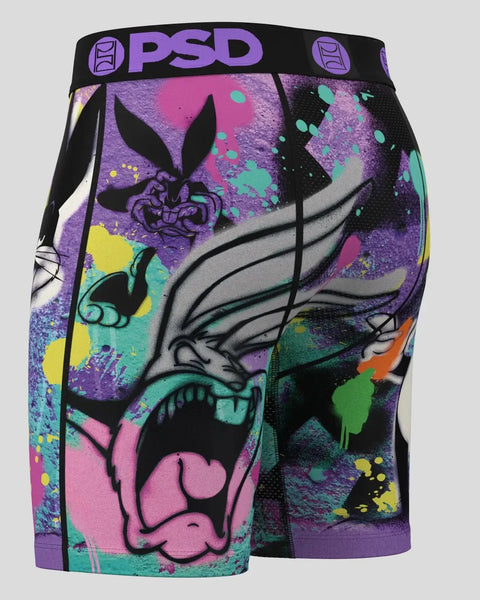PSD men's shorts with Bugs Bunny character and colorful paint splatter design on purple, pink, and teal background.