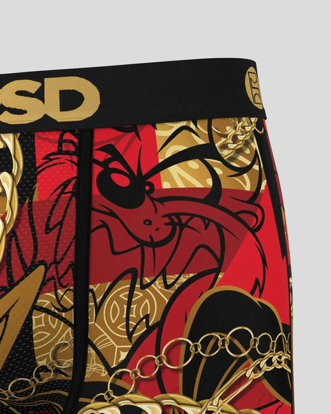 Black waistband with gold text above red and gold patterned fabric featuring Looney Tunes character illustration.