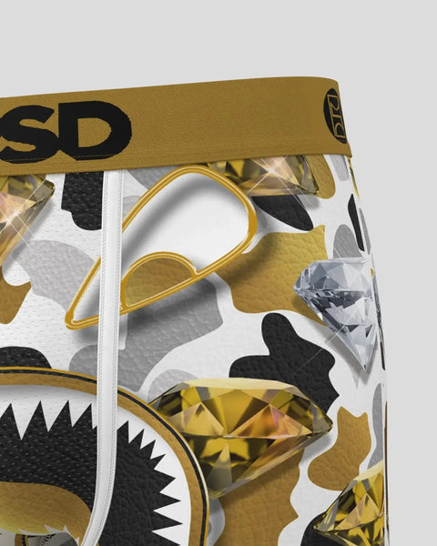 Gold and black patterned underwear waistband with crystalline geometric design elements and 