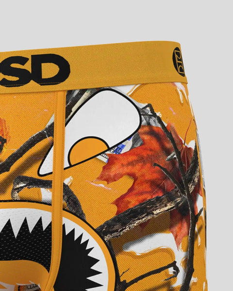 Gold and orange underwear with cartoon monster face design and black 