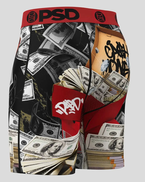 PSD boxer briefs with red waistband featuring dollar bills, cash stacks, and graffiti-style graphics on black and white patte