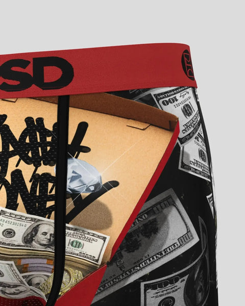 Red and tan stash box with black graphic design and US dollar bill imagery visible inside.