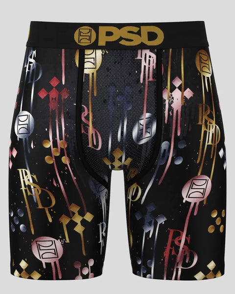 Black PSD boxer briefs with gold, pink, and white graphic print design and gold waistband logo.