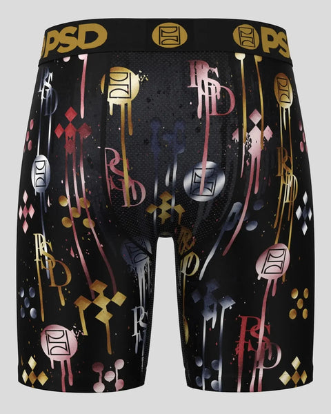 Black PSD boxer briefs with gold, pink, and red geometric patterns, logos, and abstract designs throughout.