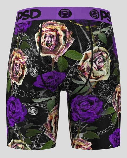 Black boxer shorts with purple and pink roses and silver chain pattern, purple waistband with PSD branding.