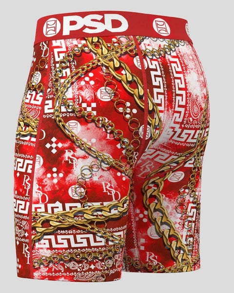 Red PSD boxer briefs with gold chain and paisley print design, white logo waistband.