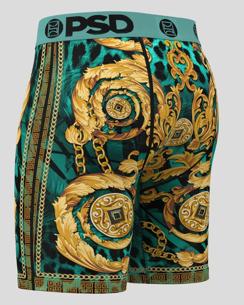 PSD men's shorts with teal cheetah print background, gold ornamental chains and baroque scrollwork design, black waistband wi