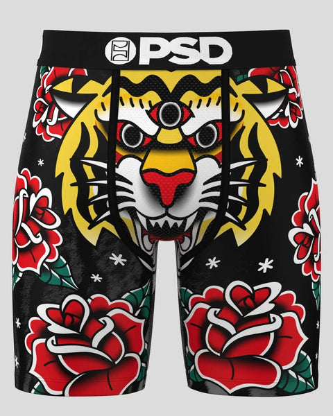 Black shorts with three-eyed tiger face and red rose tattoo-style print, PSD waistband.