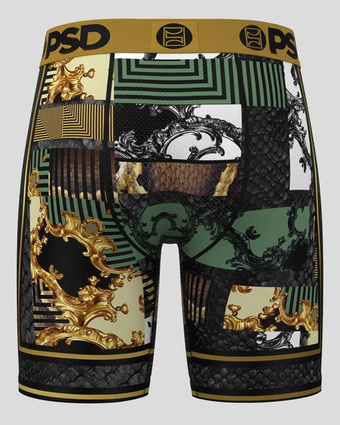 PSD brand boxer briefs with patchwork design featuring gold ornamental motifs, green stripes, black scales, and baroque patte