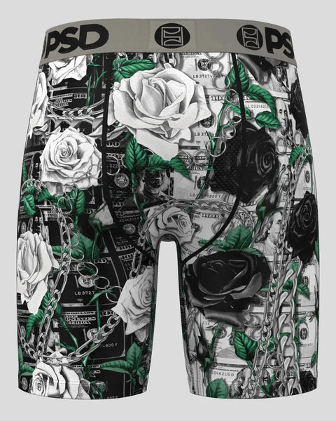 PSD boxer briefs with all-over print featuring white and black roses, green leaves, and currency pattern.