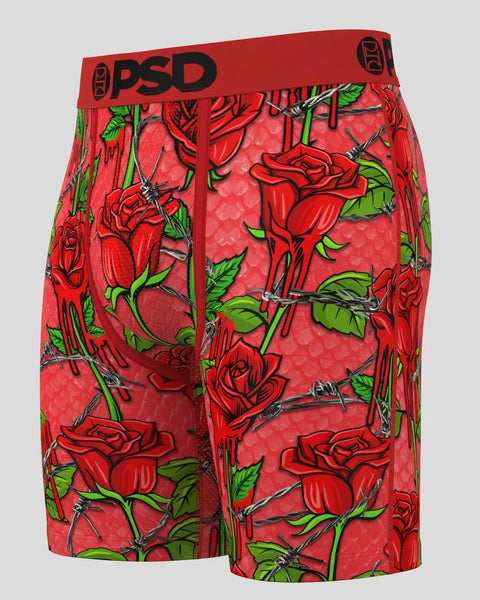 Red boxer briefs with red roses, green leaves, and black thorns throughout, featuring PSD waistband.